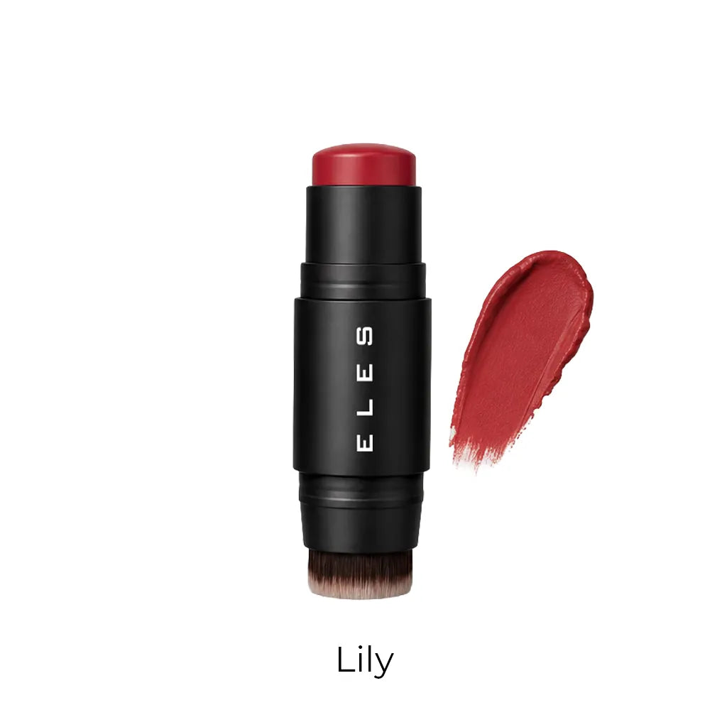 ELES cheek and lip cream in shade Lily, featuring a black cylindrical tube with white brand lettering and a red-pink product tip, shown next to a textured swipe of the lipstick on a white background.