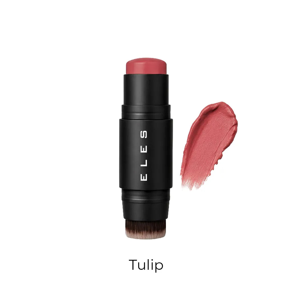 ELES cheek and lip cream in the shade Tulip, featuring a black cylindrical tube with white brand lettering and a swatch of the dusty rose pink product on the right, set against a plain white background.