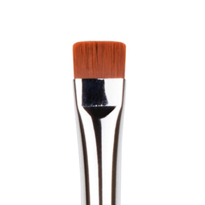A flat definer brush with a silver metal handle and orange synthetic bristles, designed for precise makeup application.