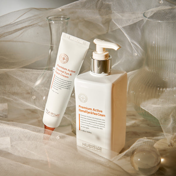 Two skincare products on a soft, light background