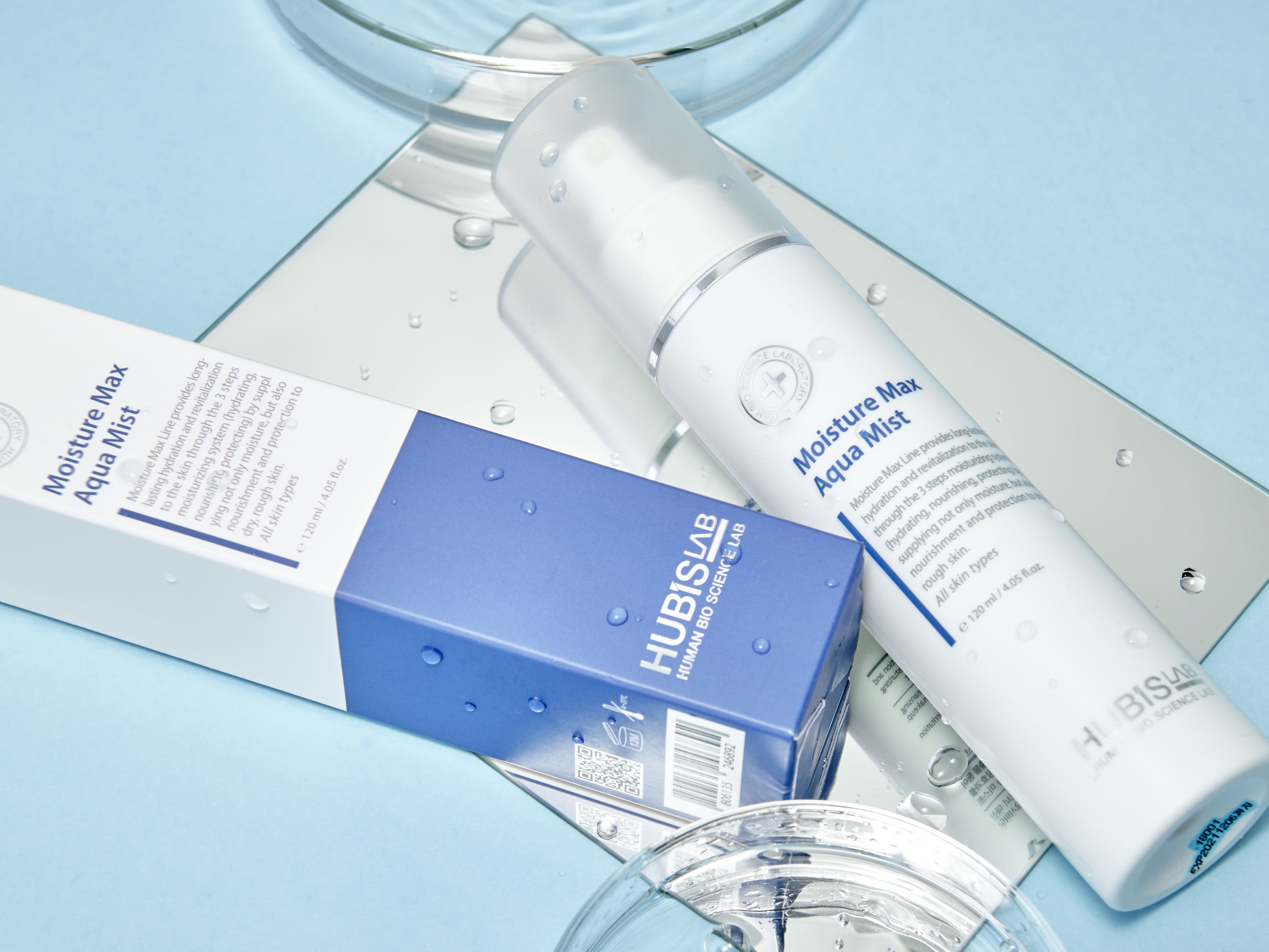 Hubishas Moisture Max Aqua Mist with packaging on a light blue background