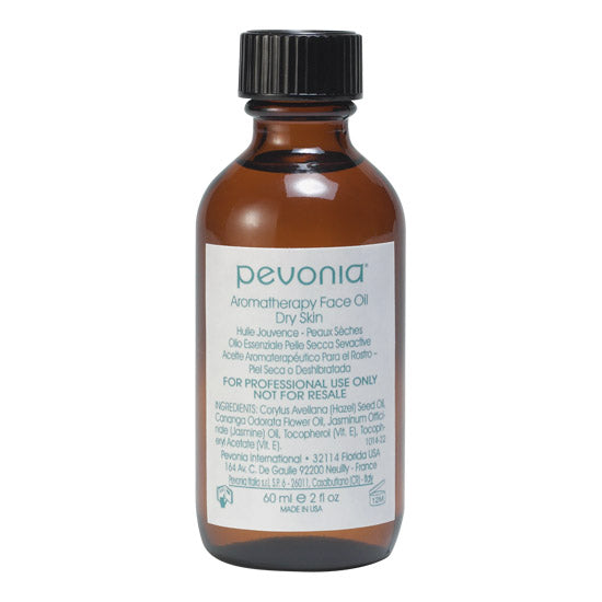 A bottle of Pevonia aromatherapy face oil for dry skin, 60ml size, with a black cap and a label that includes the brand name and product information.