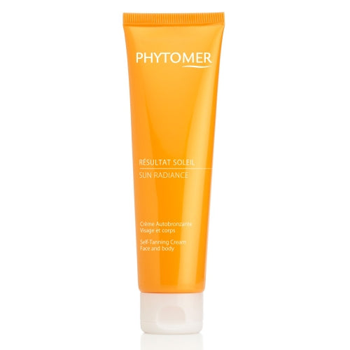 A tube of Phytomer Sun Radiance Self Tanning Cream with orange packaging.