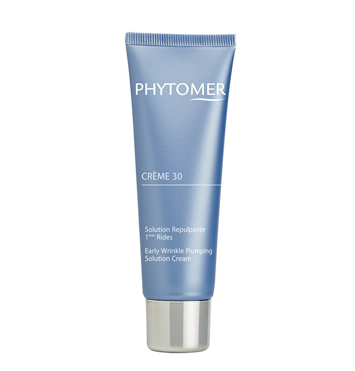 A tube of Phytomer Crème 30 Early Wrinkle Plumping Cream with a blue label and a silver band on the cap.