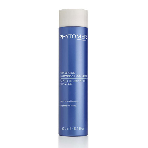 A bottle of Phytomer Gentle Illuminating Shampoo with Marine Plants, 250ml size, predominantly blue packaging with white and green text.