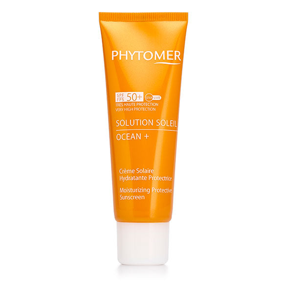 A tube of Phytomer Solution Soleil Ocean + Sunscreen, with orange packaging and white cap.