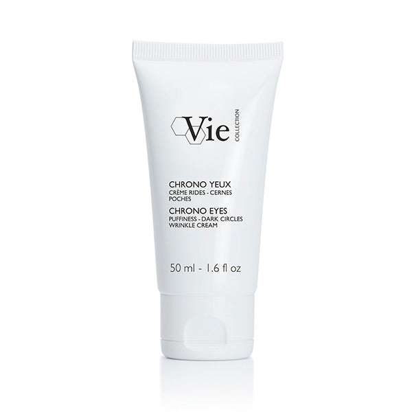 A tube of Vie Collection Chrono Eyes cream designed for reversing signs of aging such as puffiness, dark circles, and wrinkles.