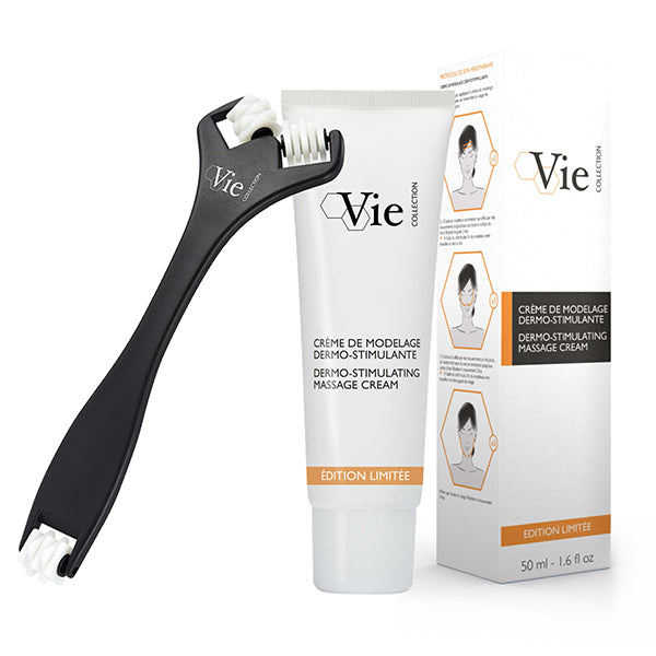 A product image featuring a tube of Dermo-Stimulating Massage Cream and a face applicator with a wide tip, both branded with 'Vie'.