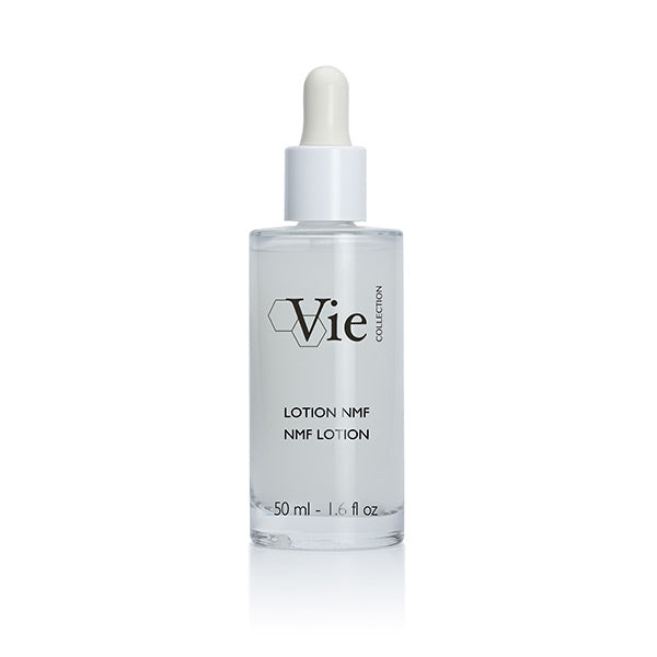 A clear bottle with a white dropper containing a face lotion marked with the brand Vie, and labeled as NMF Lotion 50ml.