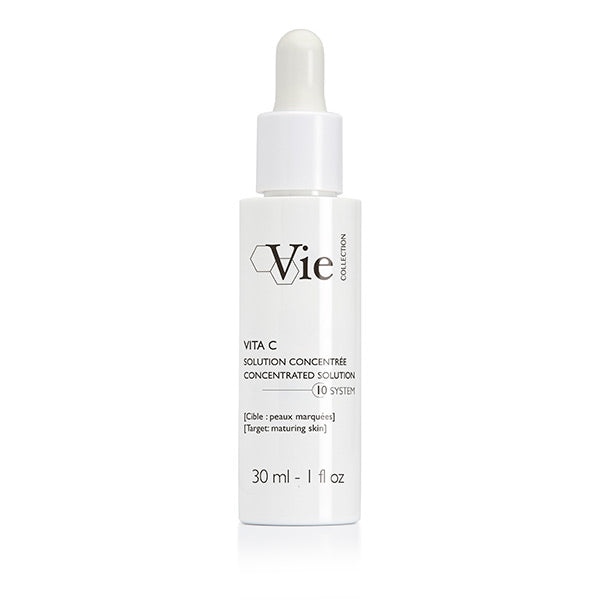 A white bottle with a dropper containing the Vita C Concentrated Solution by Vie Collection.