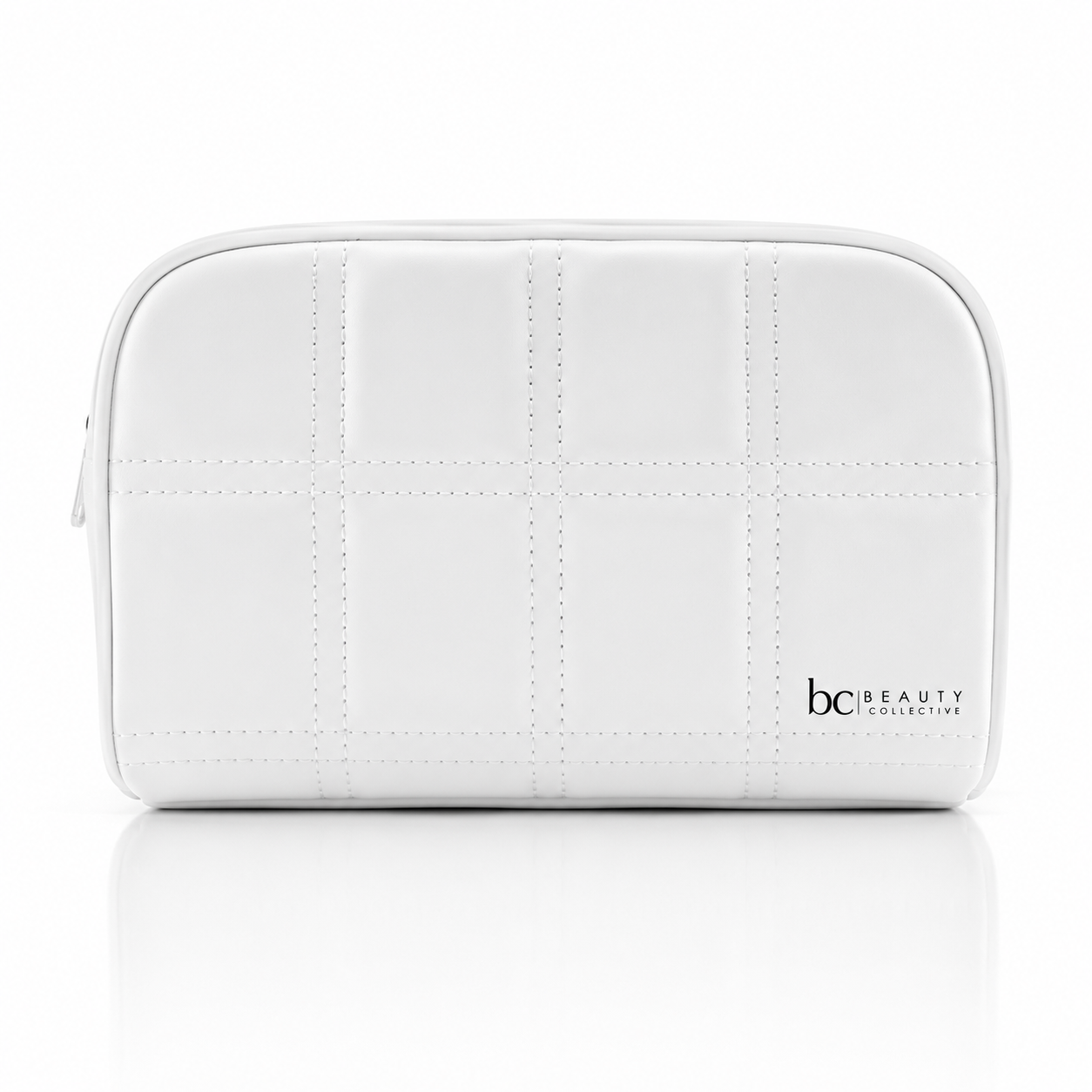 Beauty Collective white quilted cosmetic bag with zip closure on a clean white background.