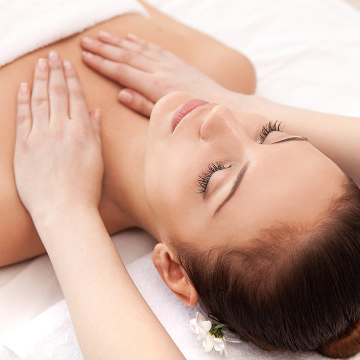 Woman receiving a massage with a focus on relaxation