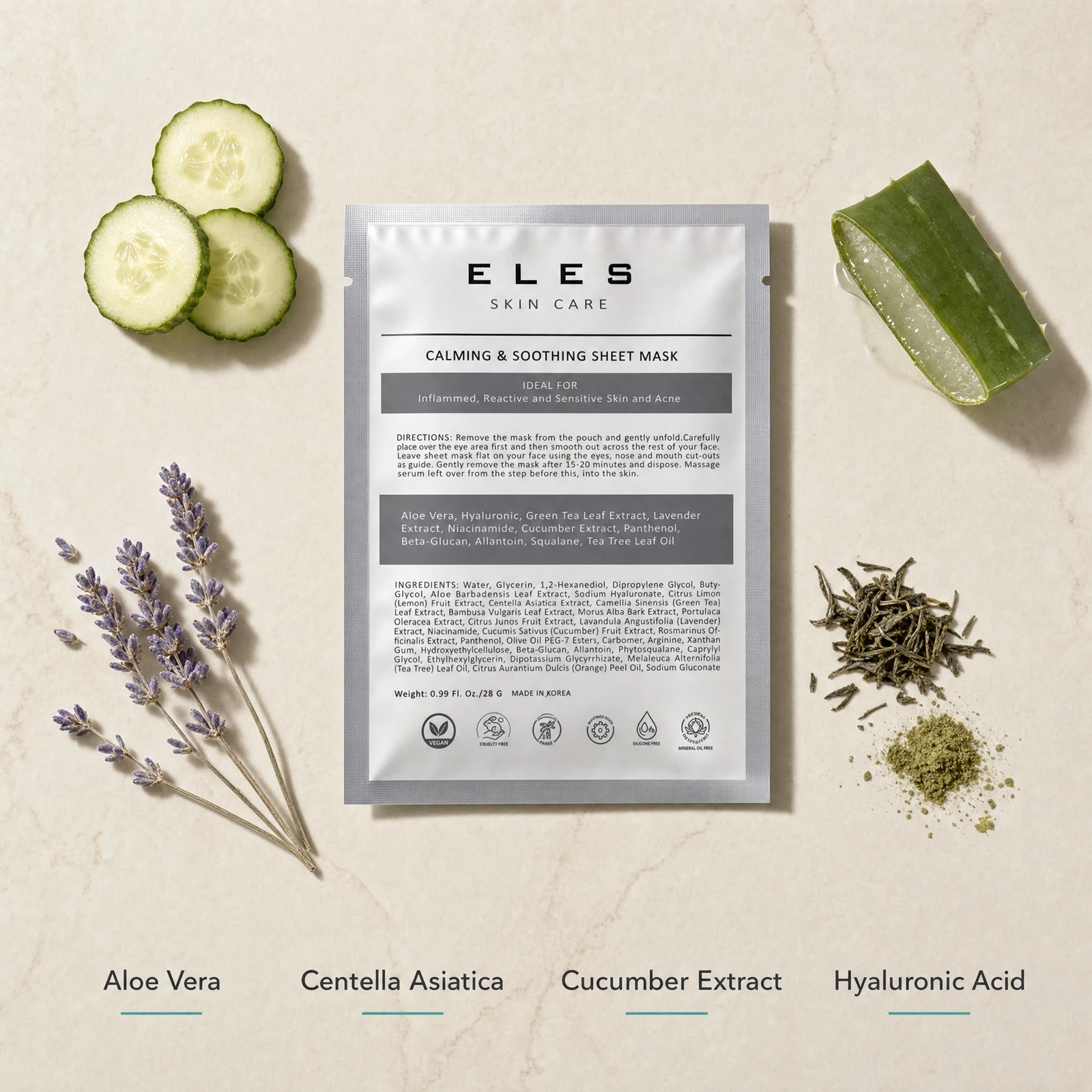ELES Calming and Soothing Sheet Mask ingredient flatlay featuring aloe vera, centella asiatica, cucumber extract and hyaluronic acid with fresh cucumber slices, aloe leaf, lavender and green tea on a warm limestone surface
