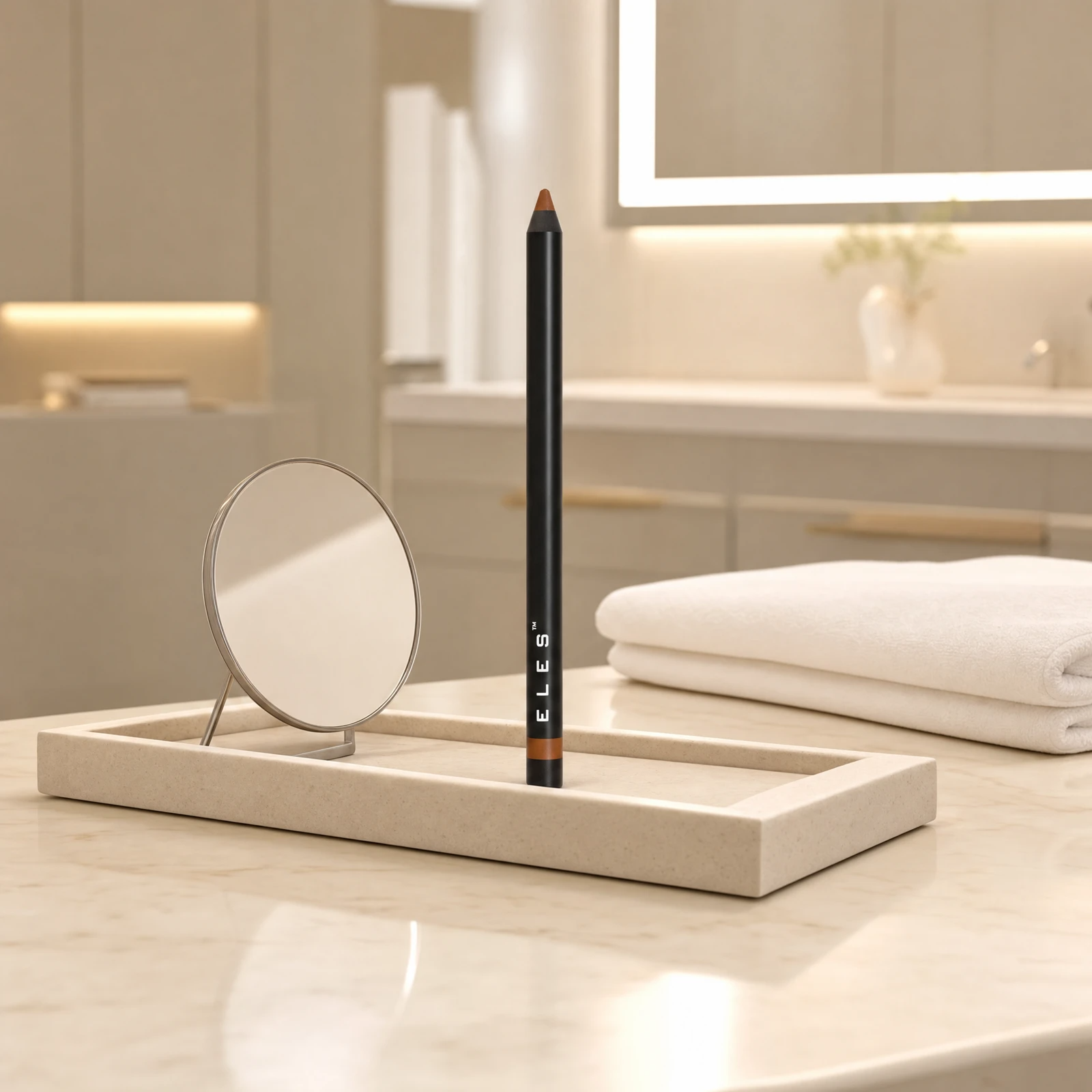 ELES Gel Lipliner standing upright on a stone tray beside a round mirror on a marble clinic bench inside a premium skin clinic treatment room, ideal for professional lip definition and finishing after facial treatments