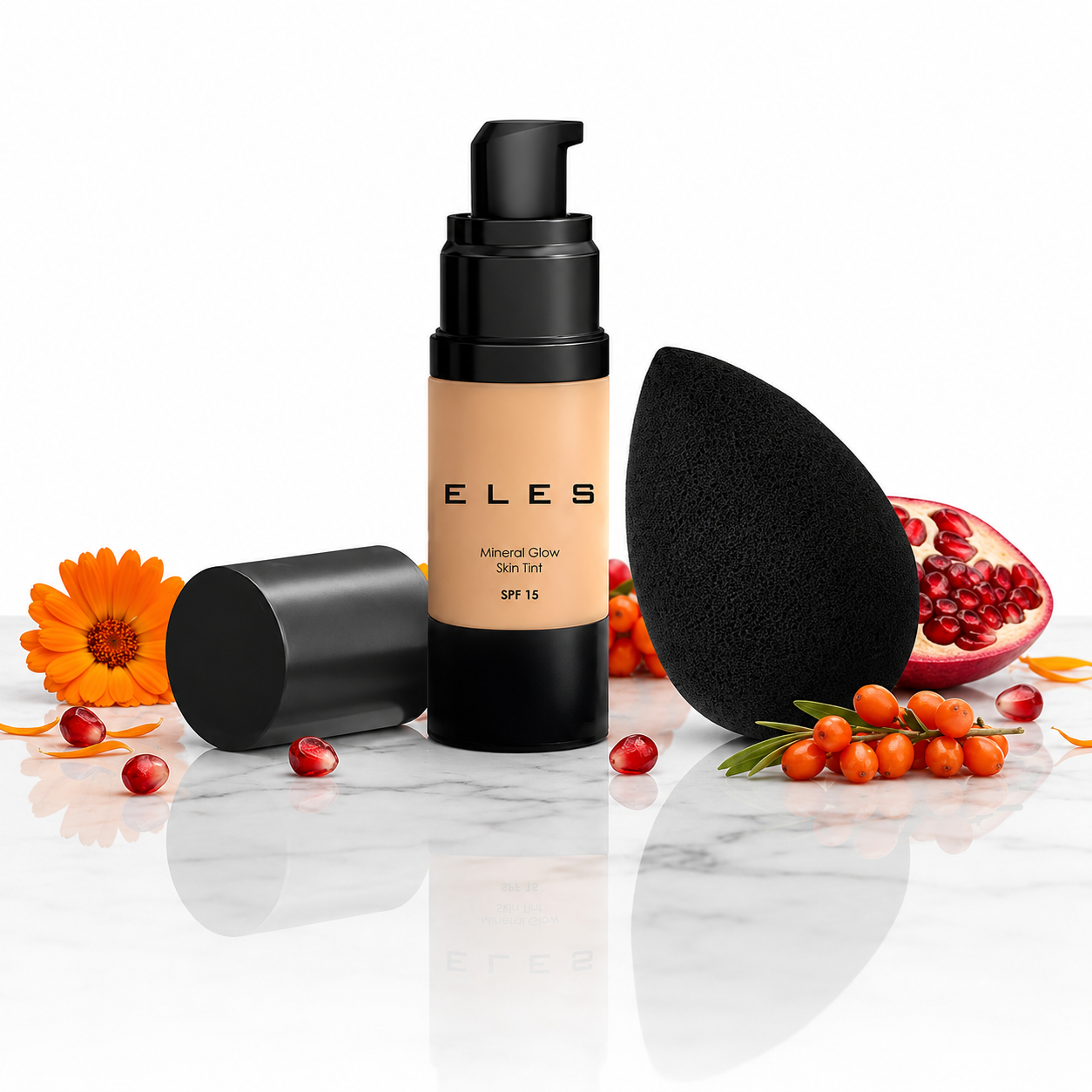 ELES Mineral Glow Skin Tint SPF 15 foundation tint with makeup sponge and skincare-inspired botanical ingredients.