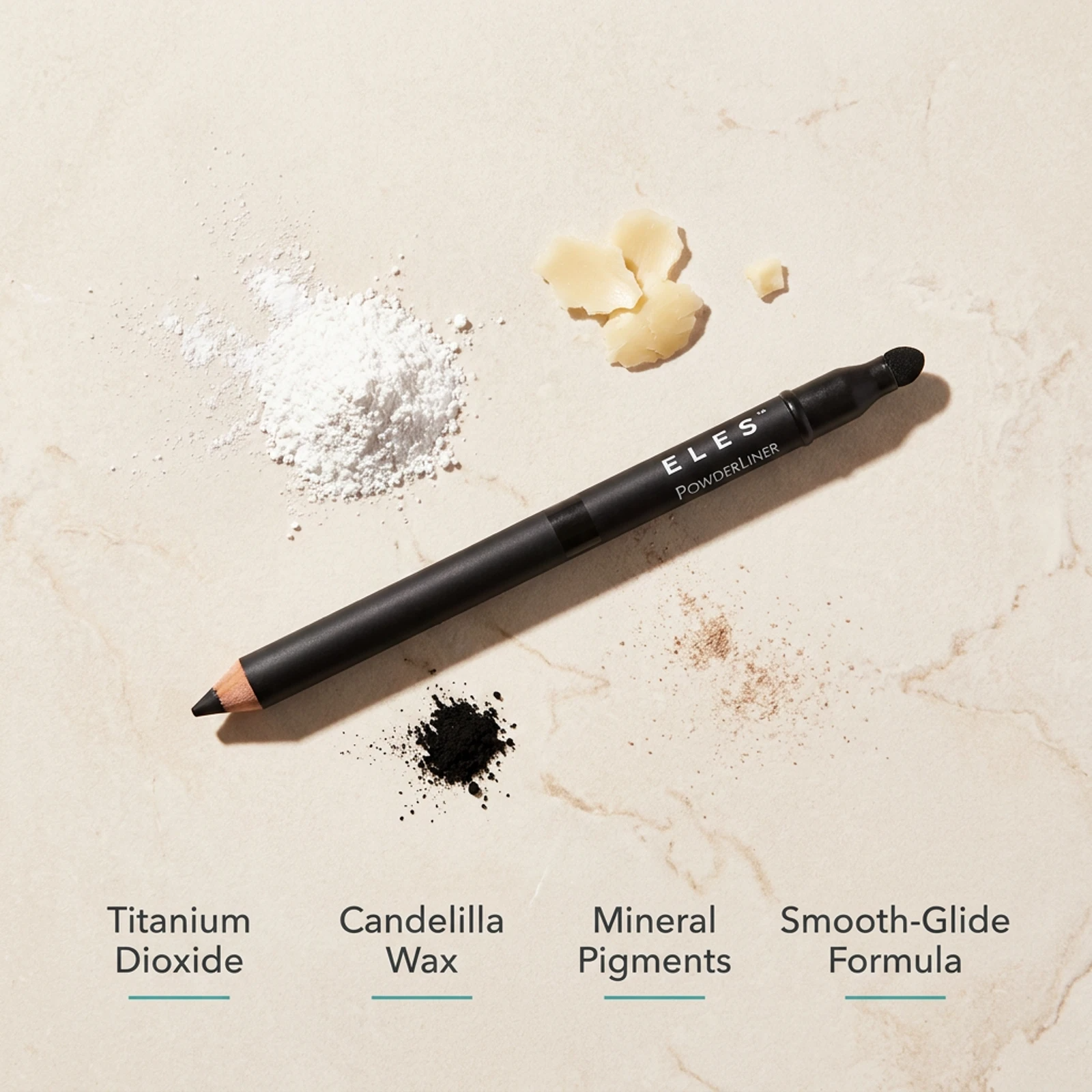 ELES Powder Liner Pencil ingredient flatlay featuring titanium dioxide, candelilla wax, mineral pigments and smooth-glide formula on a warm stone surface
