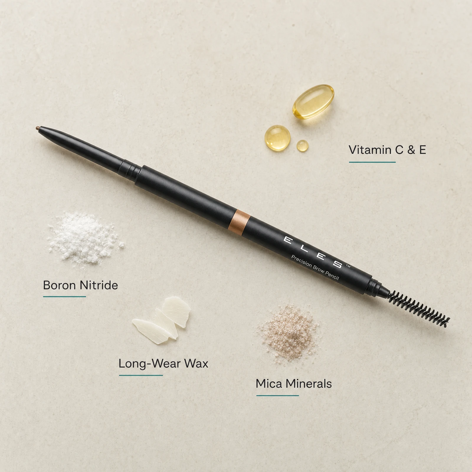ELES Precision Brow Pencil ingredient flatlay featuring Vitamin C and E, boron nitride, long-wear wax and mica minerals on a warm stone surface