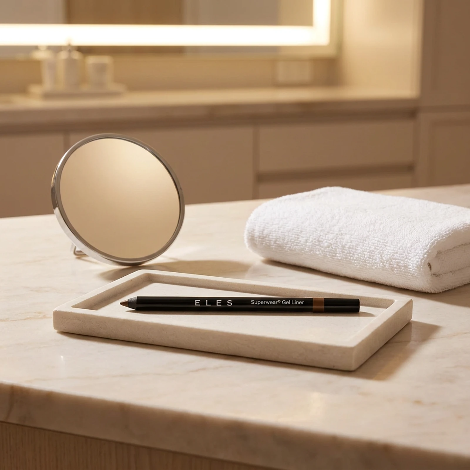 ELES Superwear Gel Liner resting on a stone tray beside a round magnifying mirror on a marble clinic bench inside a premium skin clinic treatment room, ideal for professional eye finishing after facial treatments