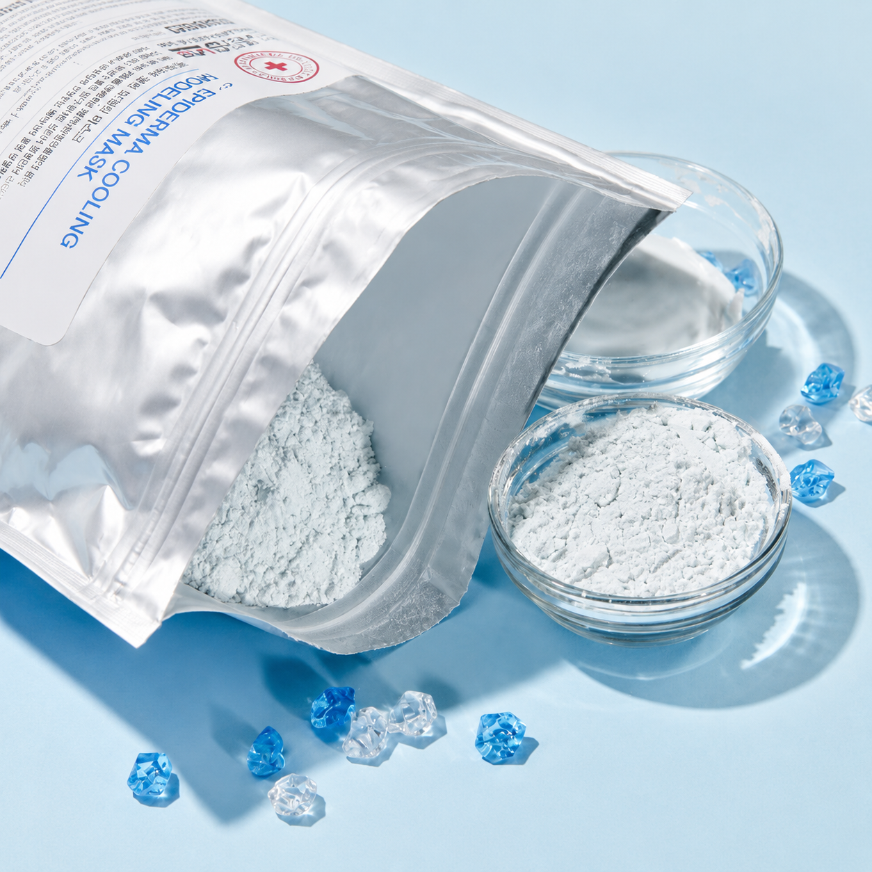 Eplus Epiderma Cooling Modeling Mask 1kg powder texture shown with silver pouch, glass bowl and cooling blue accents.