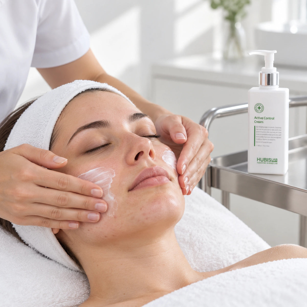 Therapist applying Active Control Cream during facial finishing