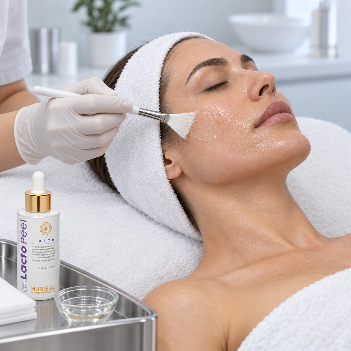 Professional brush application with Dr. Lacto Peel Beta 50 ml on the treatment tray.