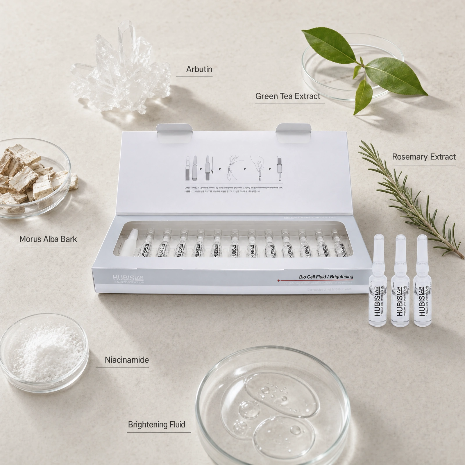 Hubislab Bio Cell Brightening Fluid 12 x 2ml ingredient flatlay with Arbutin, Green Tea Extract, Morus Alba Bark, Rosemary Extract, Niacinamide and Brightening Fluid.