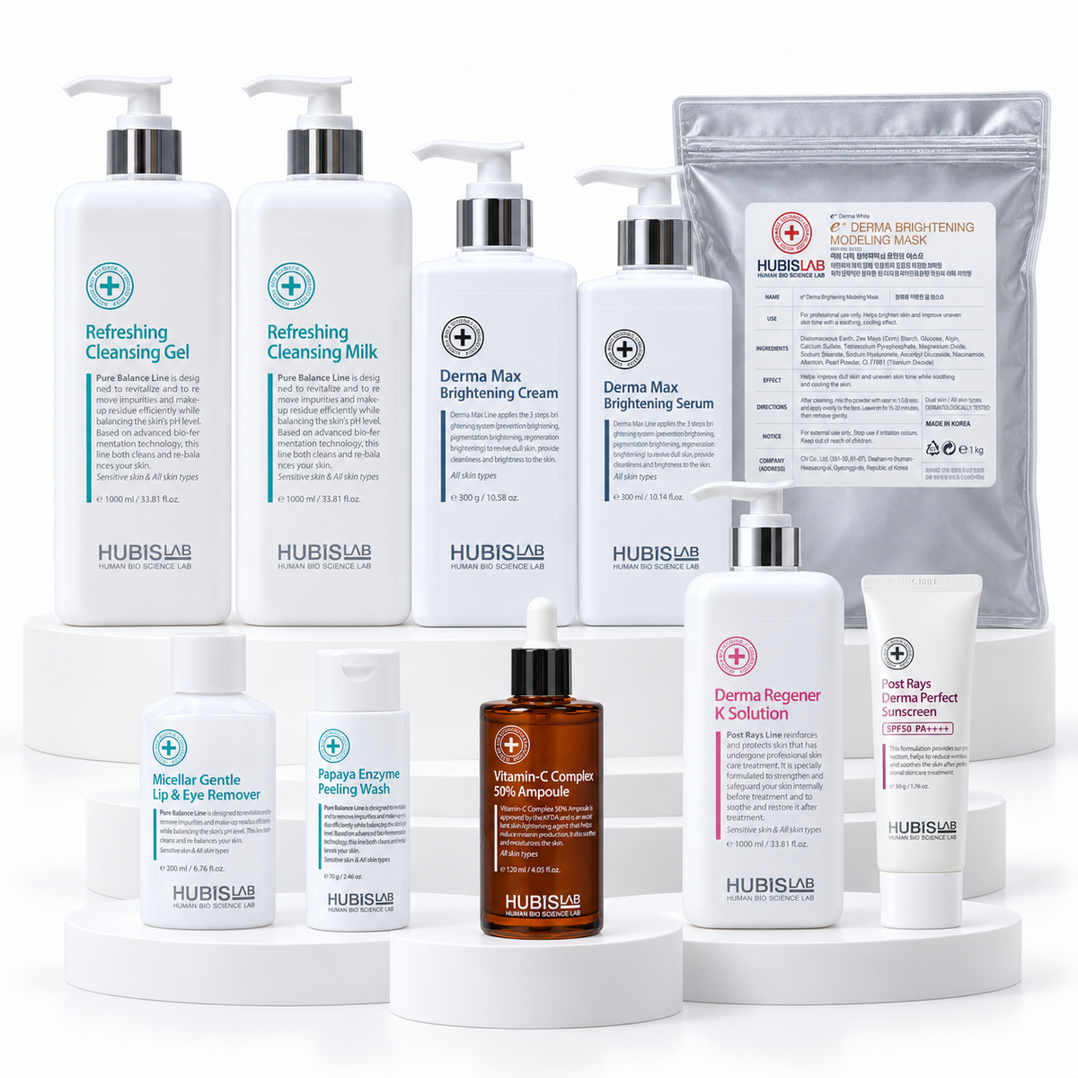All ten HUBISLAB Brightening Skin Treatment products, including professional cleansers, Derma Max products, Vitamin-C Ampoule, modelling mask, K Solution and SPF50 sunscreen.