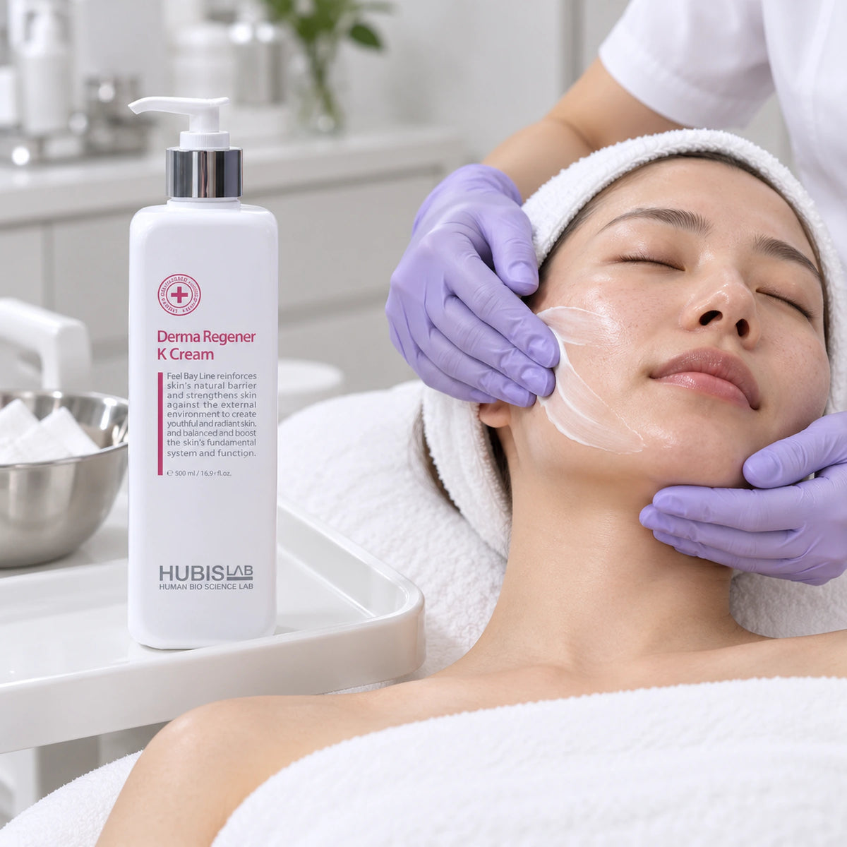 Therapist applying HUBISLAB Derma Regener K Cream beside the professional pump bottle