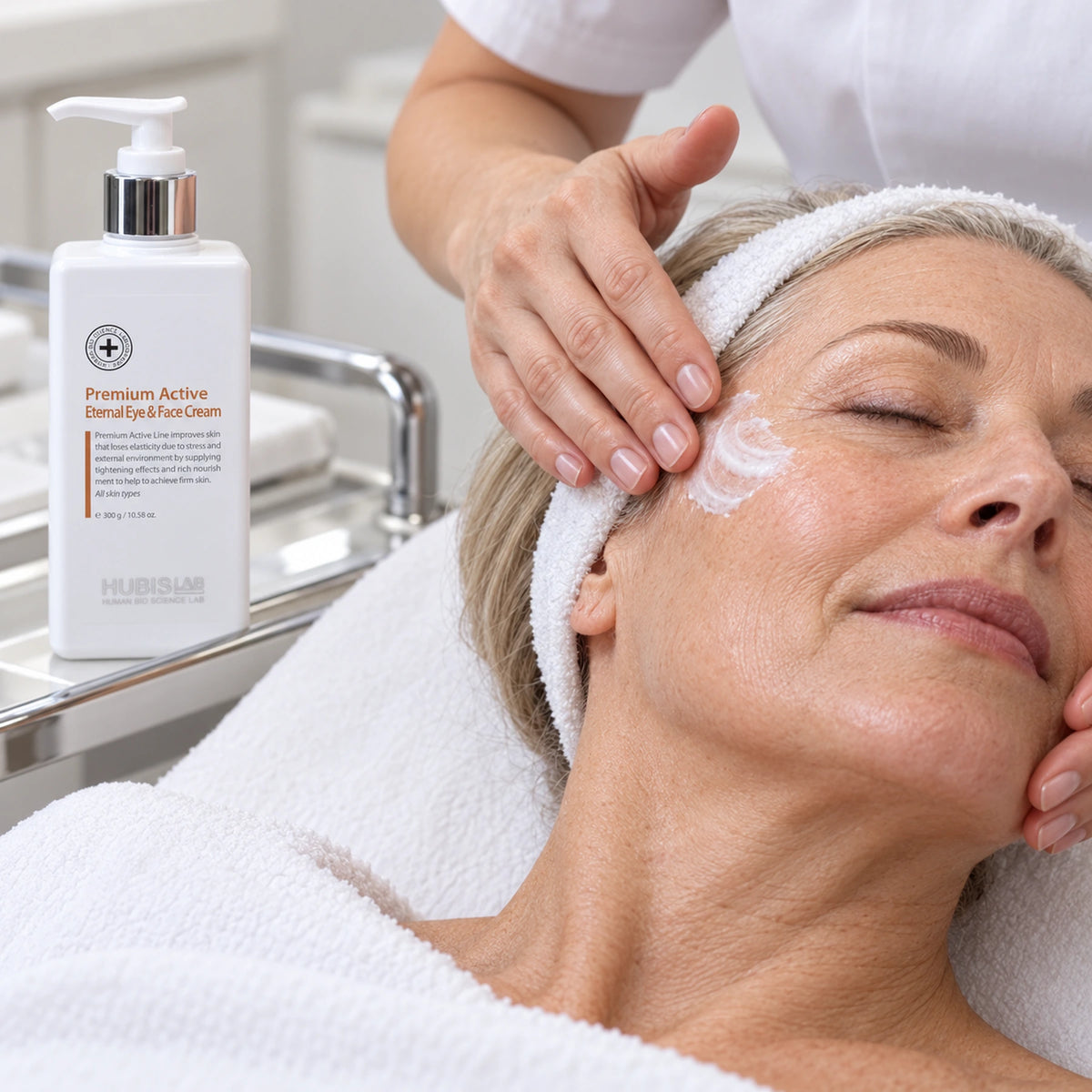 Therapist applying HUBISLAB eternal cream with the 300 g presentation shown.