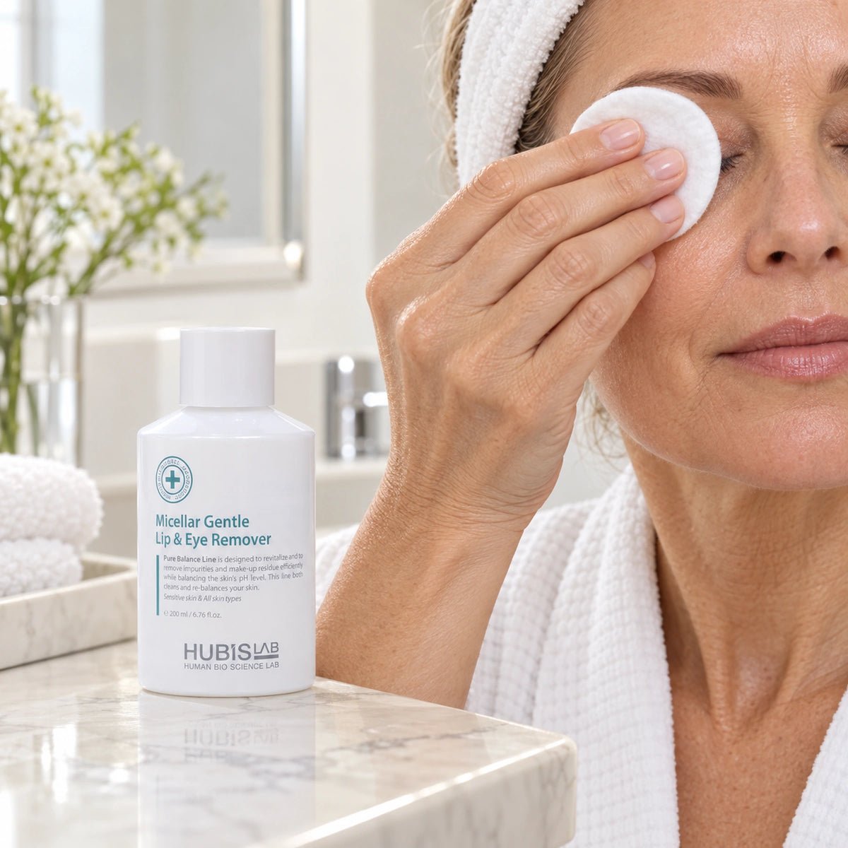 Client applying HUBISLAB micellar remover with the 200 ml presentation shown.