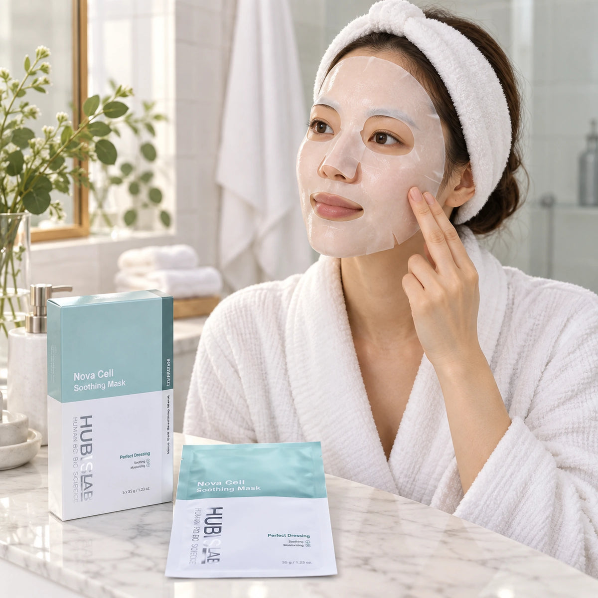 Woman wearing a Nova Cell Soothing sheet mask at home
