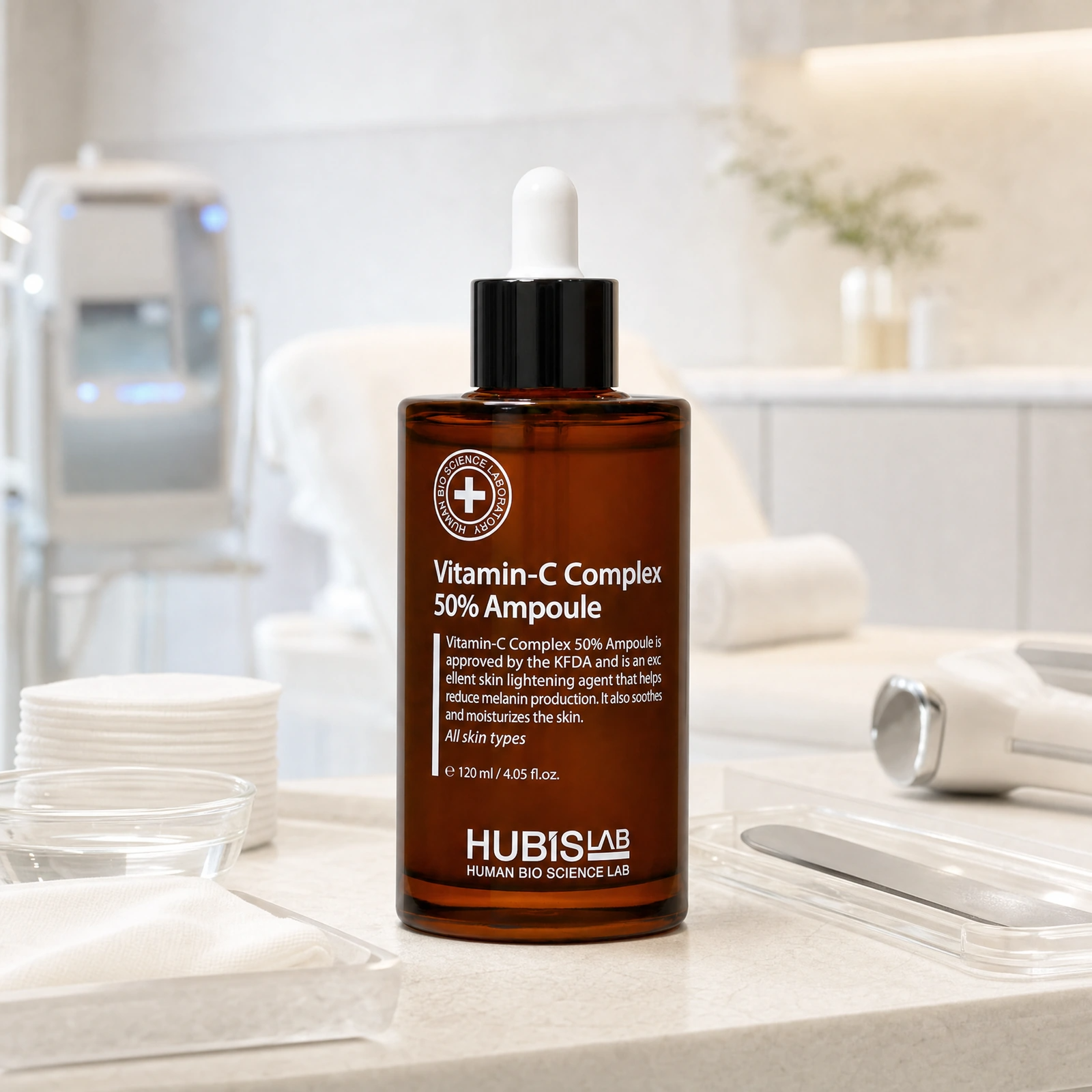 Hubislab Derma Max Vitamin-C Complex 50% Ampoule 120ml displayed in a premium clinical treatment-room setting for brightening ampoule protocols, dull uneven skin tone and radiance-focused facial treatments.