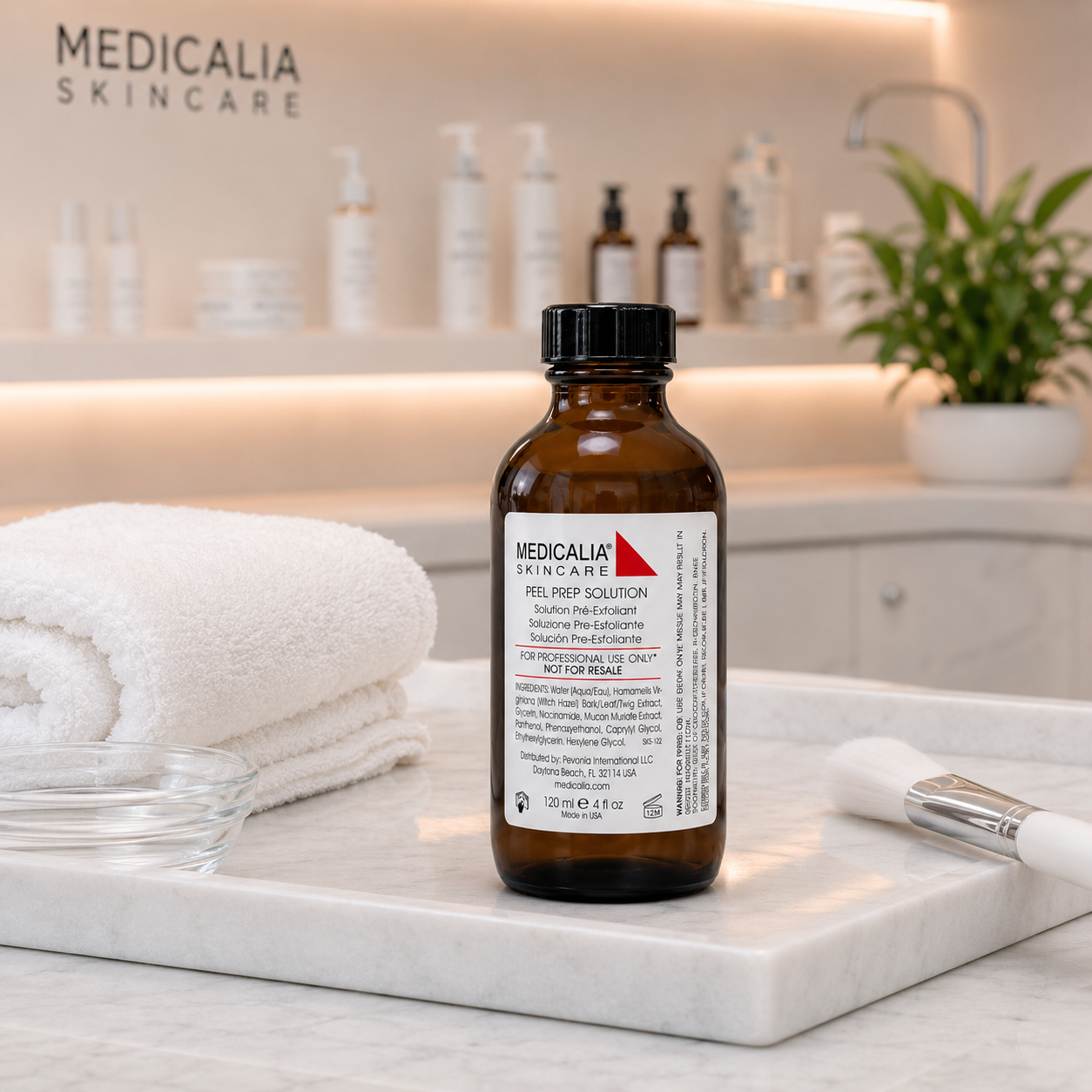 Medicalia Peel Prep Solution displayed on a marble clinic treatment tray with towels, bowl and brush in a professional facial peel treatment setting.