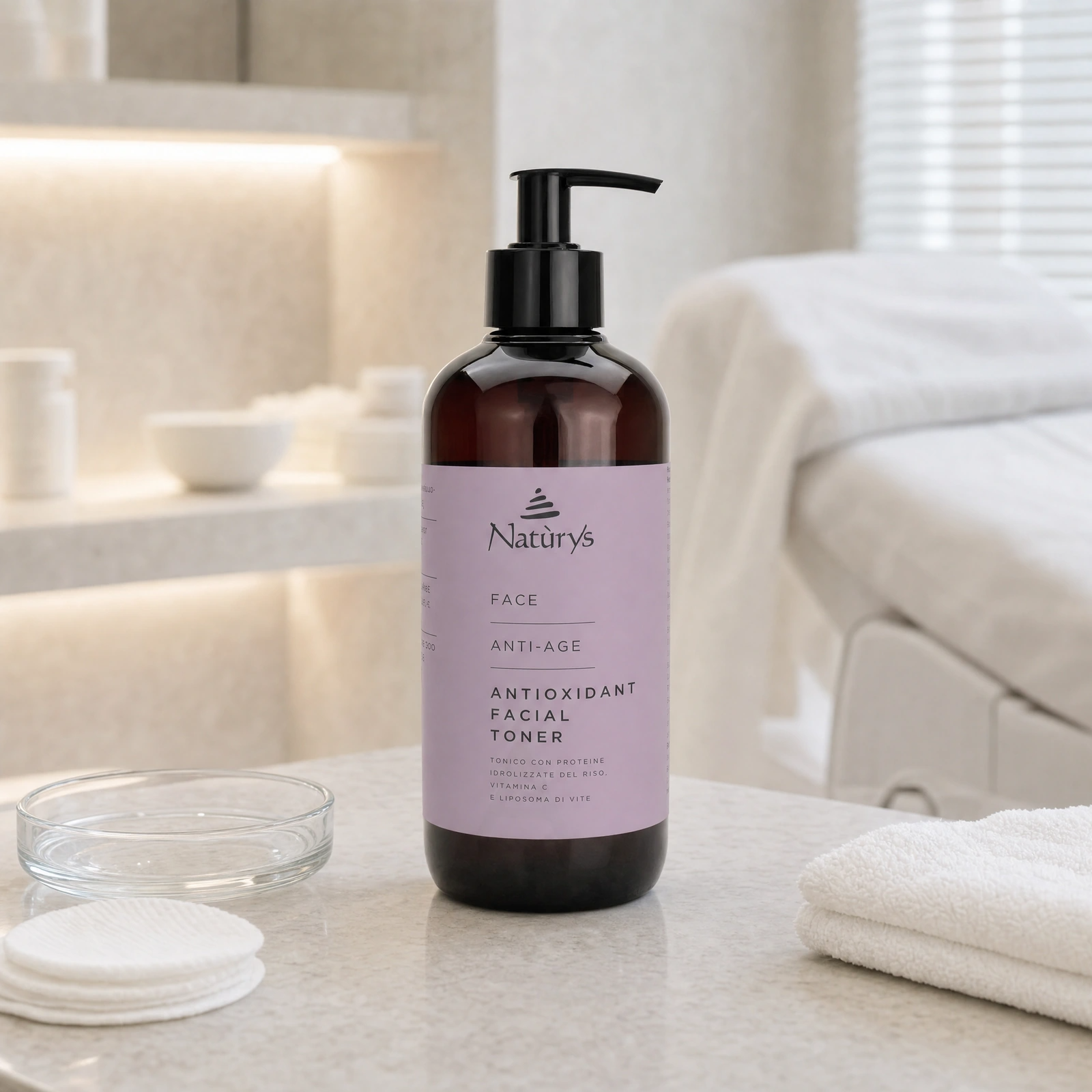 Naturys Anti-Age Antioxidant Facial Toner 500ml displayed in a premium clinical treatment-room setting for professional post-cleanse antioxidant toning protocols.