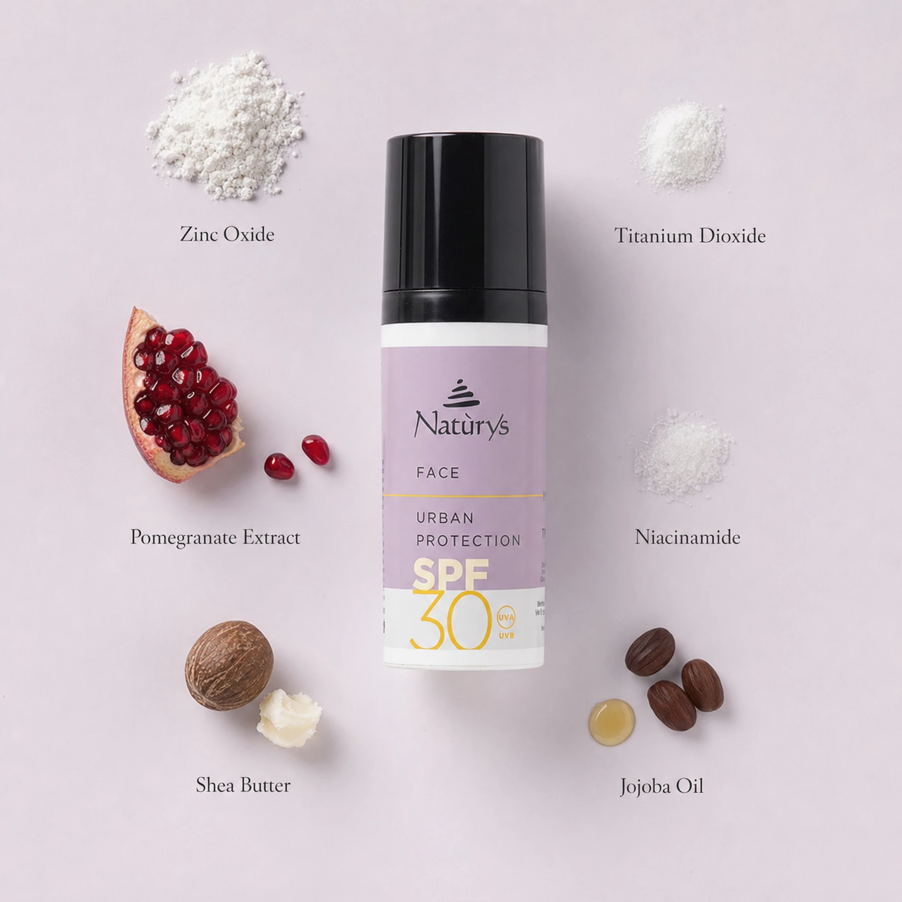 Naturys Face Urban Protection Cream SPF 30 50ml ingredient flatlay on soft lavender-white surface with labelled ingredients: Zinc Oxide, Titanium Dioxide, Pomegranate Extract, Niacinamide, Shea Butter, and Jojoba Oil