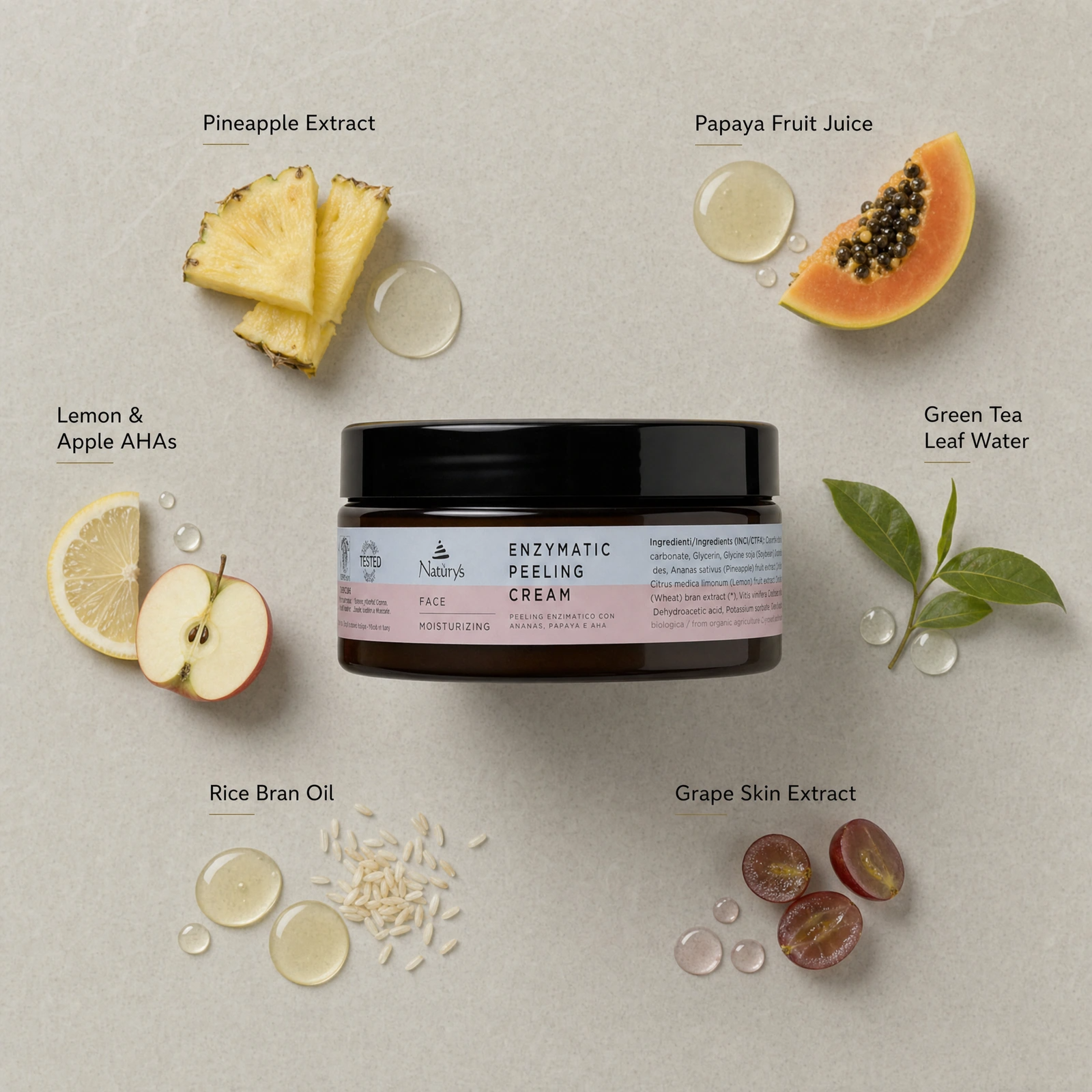 Naturys Moisturizing Enzymatic Peeling Cream 250ml ingredient flatlay with Pineapple Extract, Papaya Fruit Juice, Lemon and Apple AHAs, Green Tea Leaf Water, Rice Bran Oil and Grape Skin Extract.