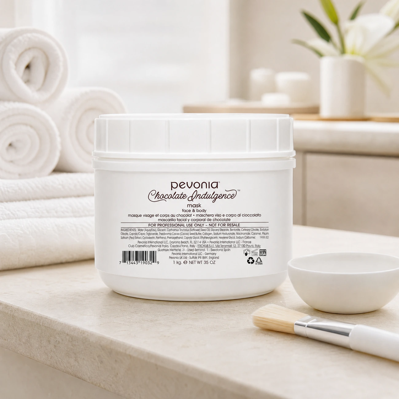 Pevonia Chocolate Indulgence Mask Face & Body 1kg professional white tub styled in a serene clinical spa treatment room for Beauty Collective Pro.