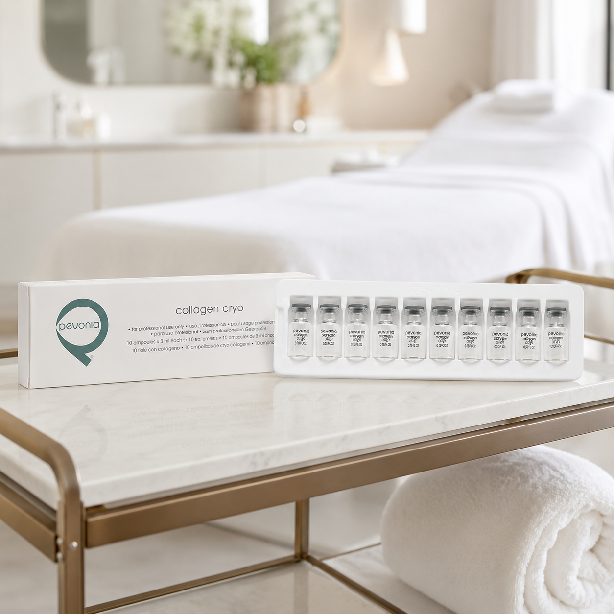 Pevonia Collagen Cryo displayed in an upmarket spa treatment room with the product box and vial tray styled in a premium beauty clinic setting.