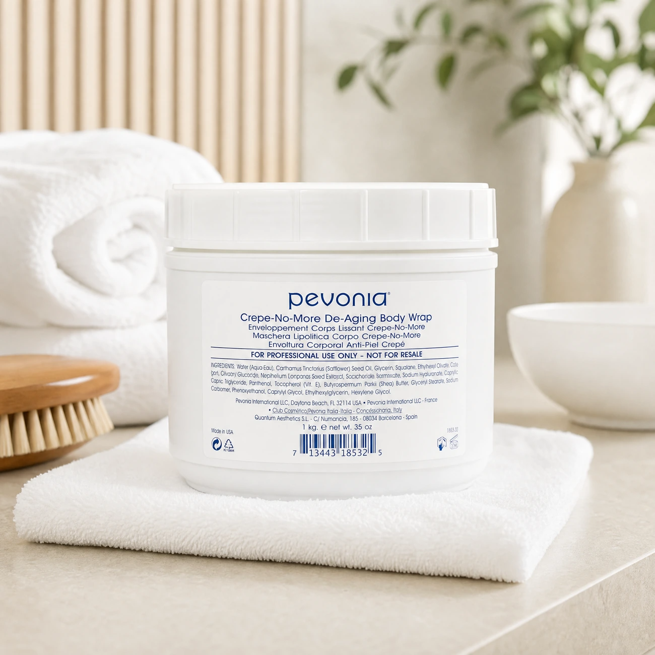Pevonia Crepe-No-More De-Aging No Rinse Body Wrap 1kg professional tub styled in a serene clinical spa body treatment room for Beauty Collective Pro.