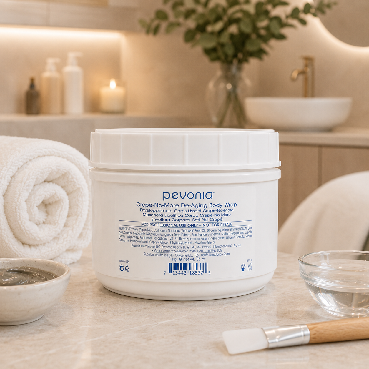 Pevonia Crepe-No-More De-Aging Body Wrap 1kg jar displayed in an upmarket day spa body treatment room with unbranded body wrap treatment accessories.