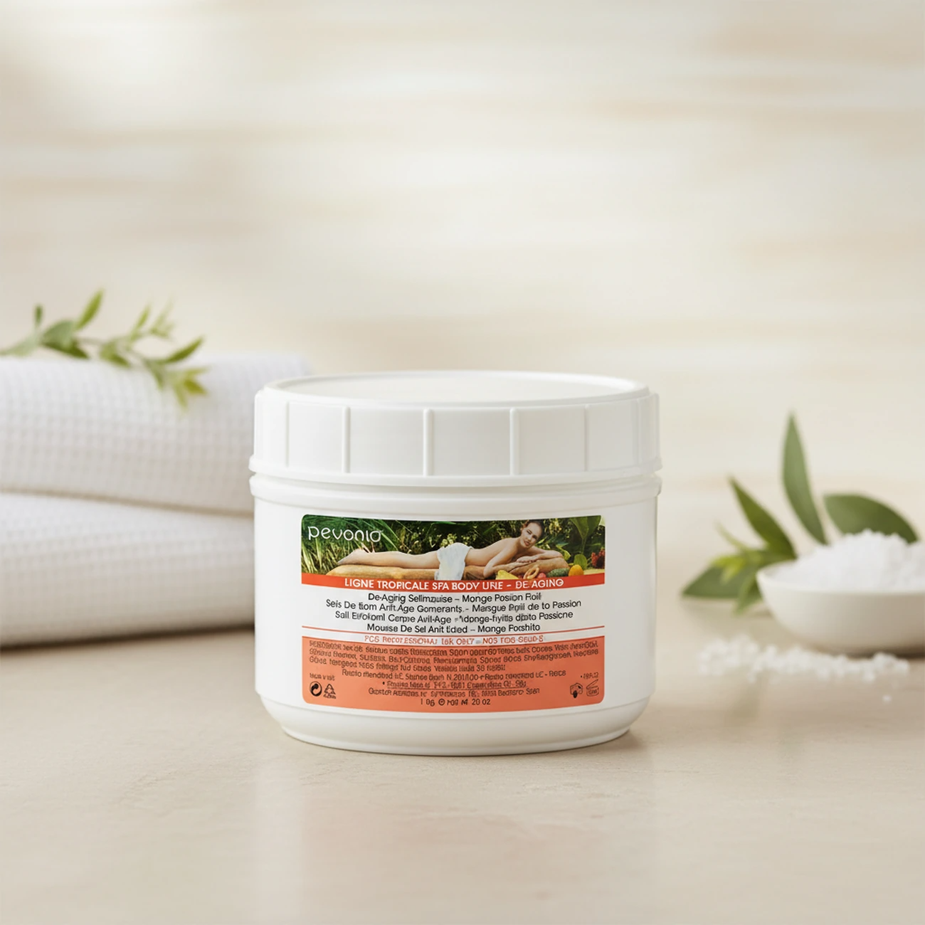 Pevonia De-Ageing Saltmousse Mango Passionfruit 1kg professional jar styled in a serene high-end day spa treatment room for Beauty Collective Pro.