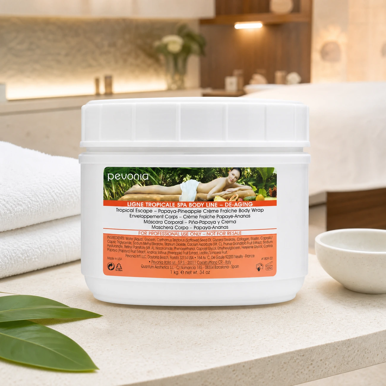 Pevonia De-Aging Papaya-Pineapple Crème Fraîche Body Wrap 1kg professional tub styled in a serene clinical spa treatment room for Beauty Collective Pro.