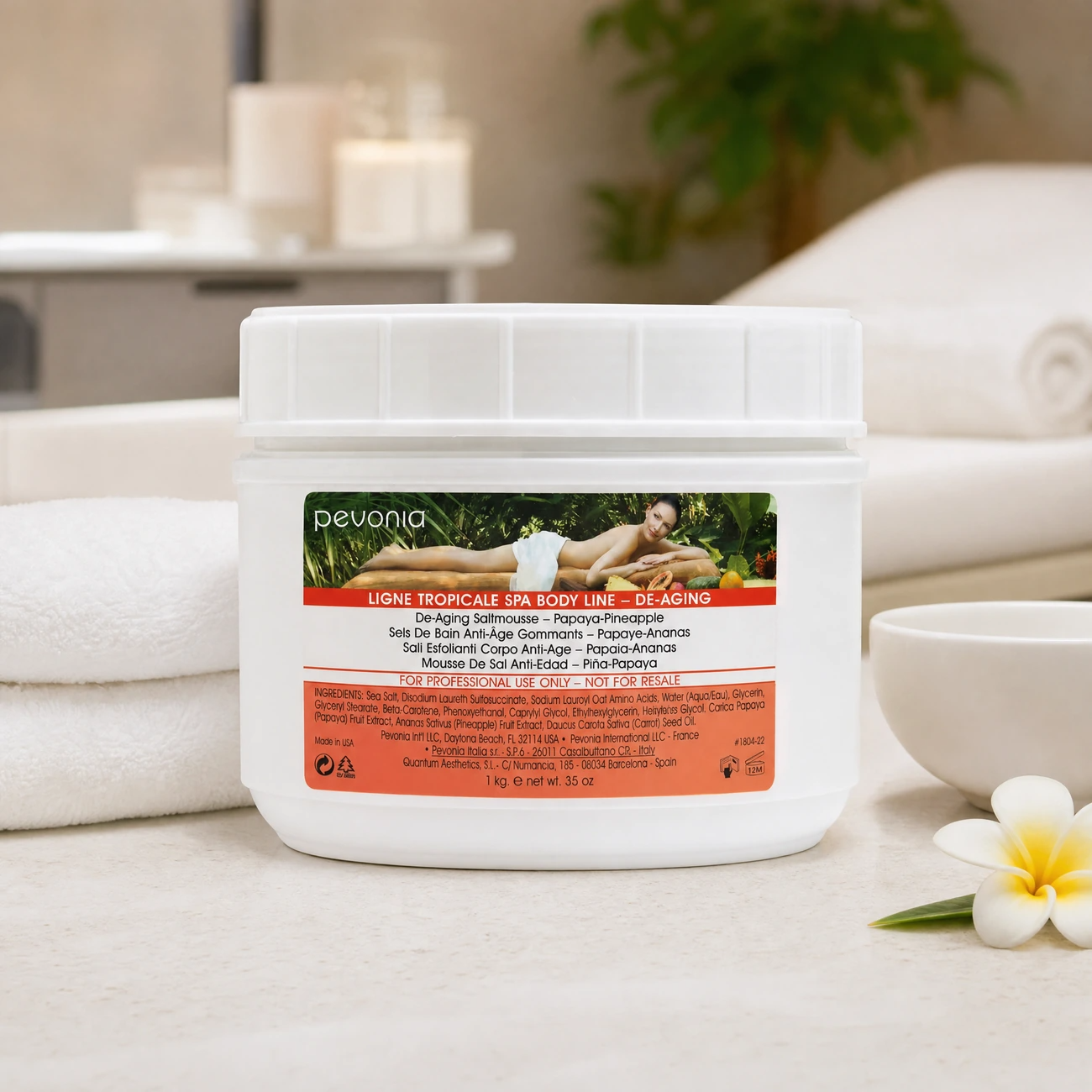 Pevonia De-Aging Saltmousse Papaya-Pineapple 1kg professional tub styled in a serene clinical spa body treatment room for Beauty Collective Pro.