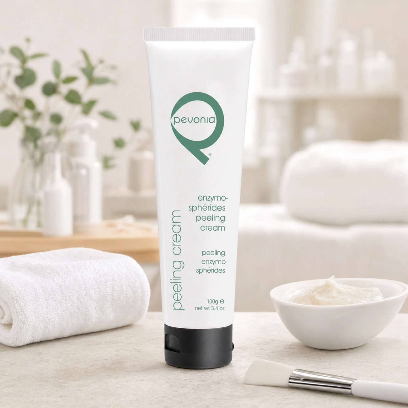 Pevonia Enzymo-Sphérides Peeling Cream 100ml professional tube styled in a clean clinic treatment setting for Beauty Collective Pro.