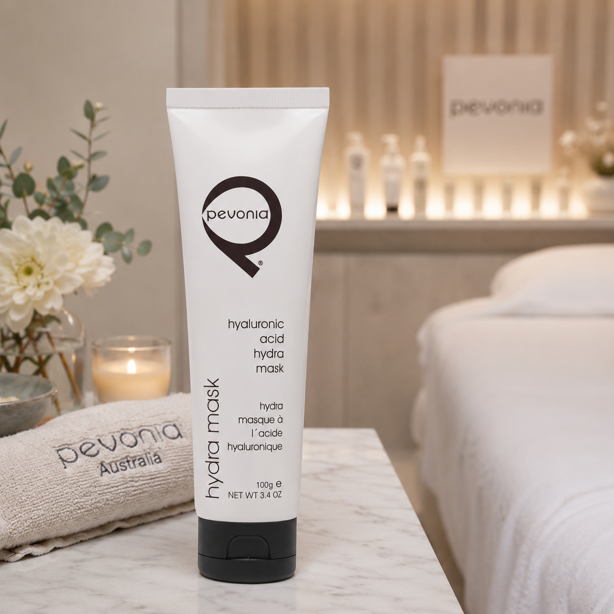 Pevonia Hyaluronic Acid Hydra Mask 100g displayed in a luxury spa treatment room for a hydrating professional facial treatment.