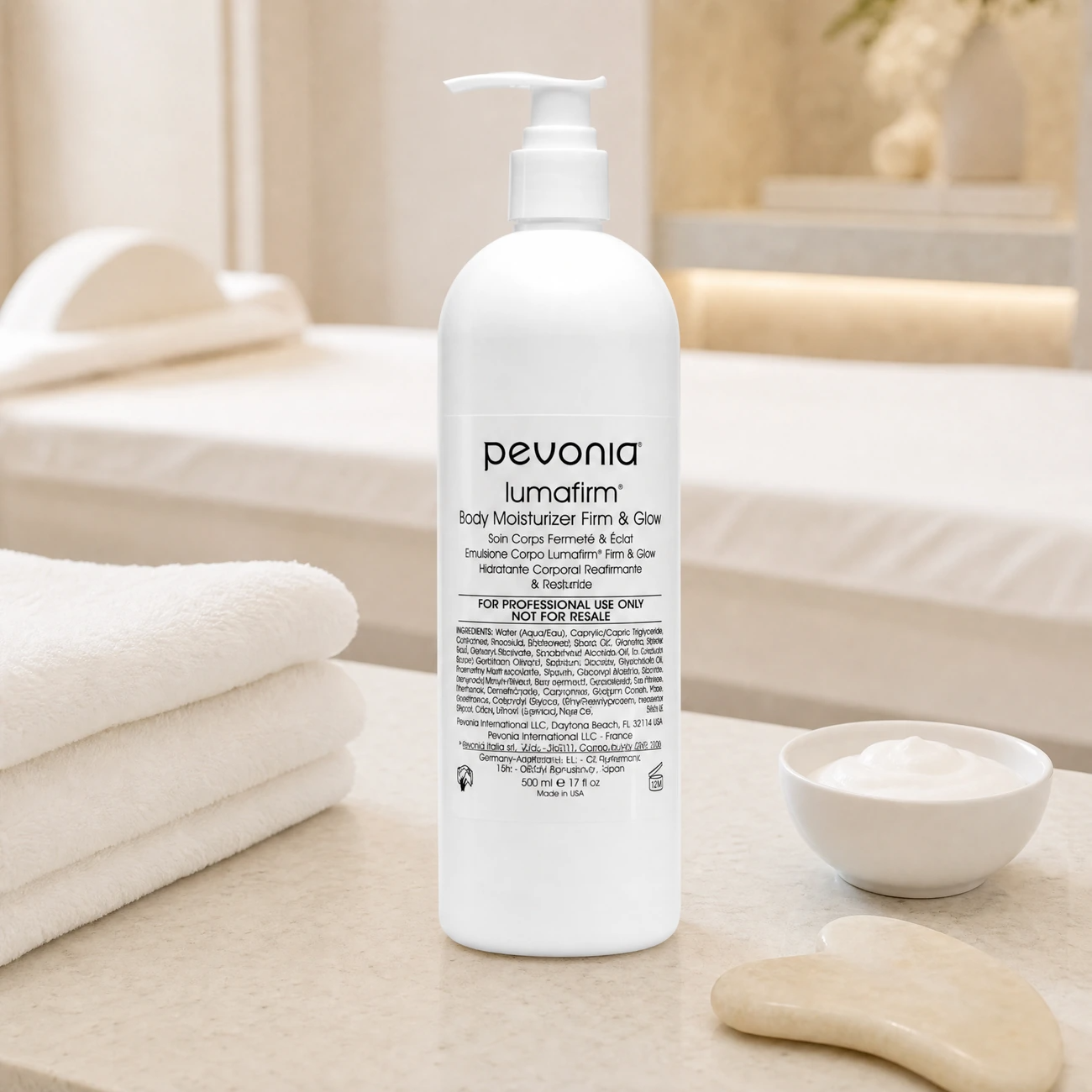 Pevonia Lumafirm Body Moisturiser Firm & Glow 500ml professional white pump bottle styled in a serene clinical spa treatment room for Beauty Collective Pro.