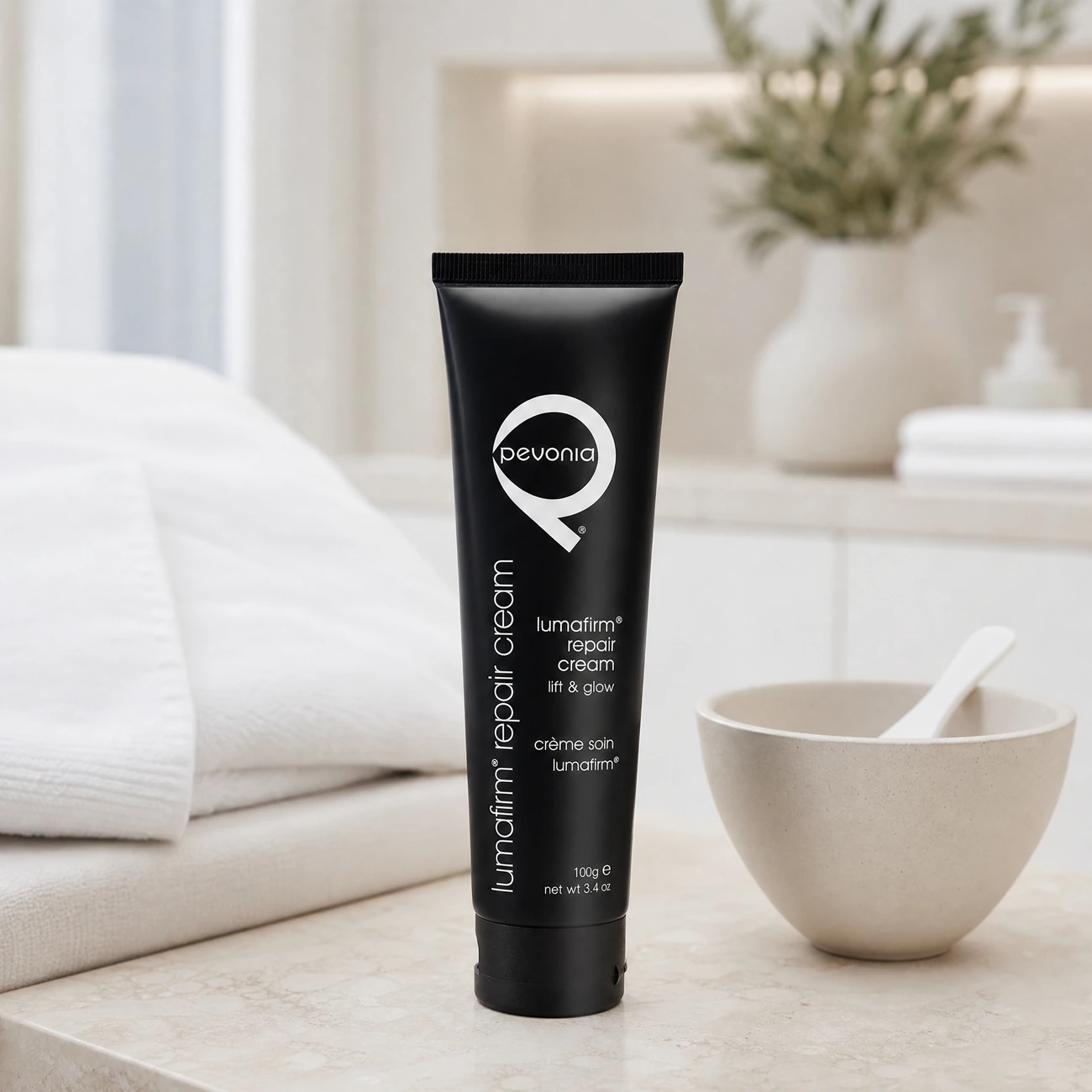 Pevonia Lumafirm Repair Cream 100ml professional matte-black tube styled in a serene clinical spa treatment room for Beauty Collective Pro.
