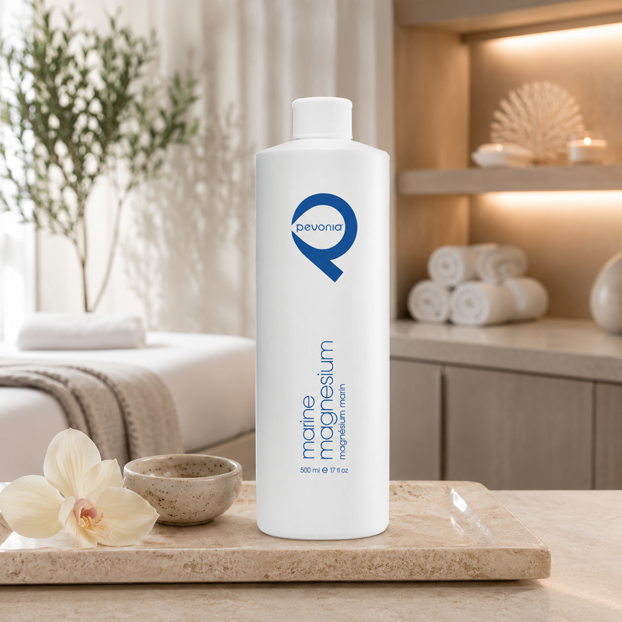 Pevonia Marine Magnesium displayed in an upmarket spa treatment room, supporting professional body treatments for tired muscles, tension relief and skin remineralisation.