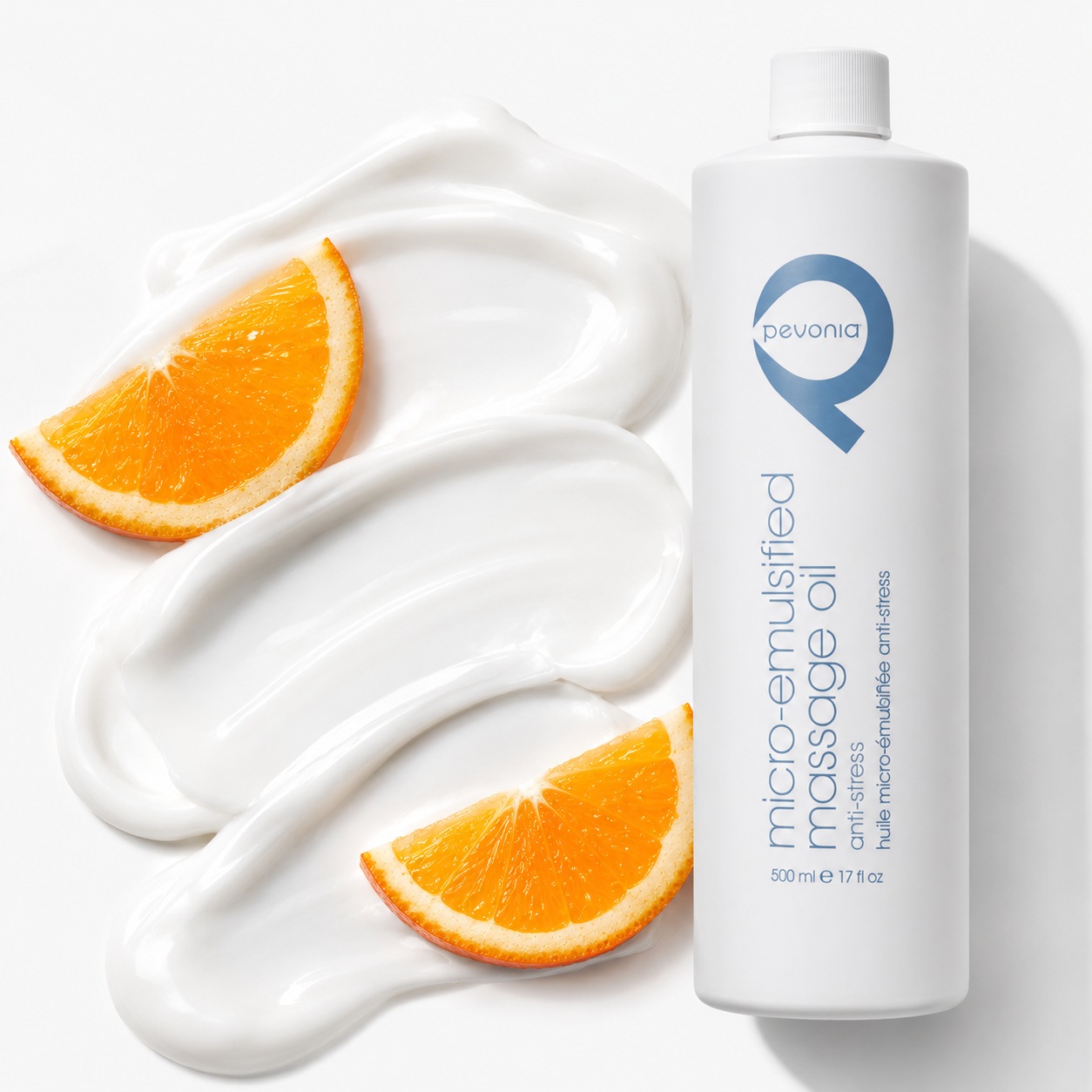 Pevonia Micro-Emulsified Massage Oil Anti-Stress 500ml with glossy emulsified texture and fresh orange slices.