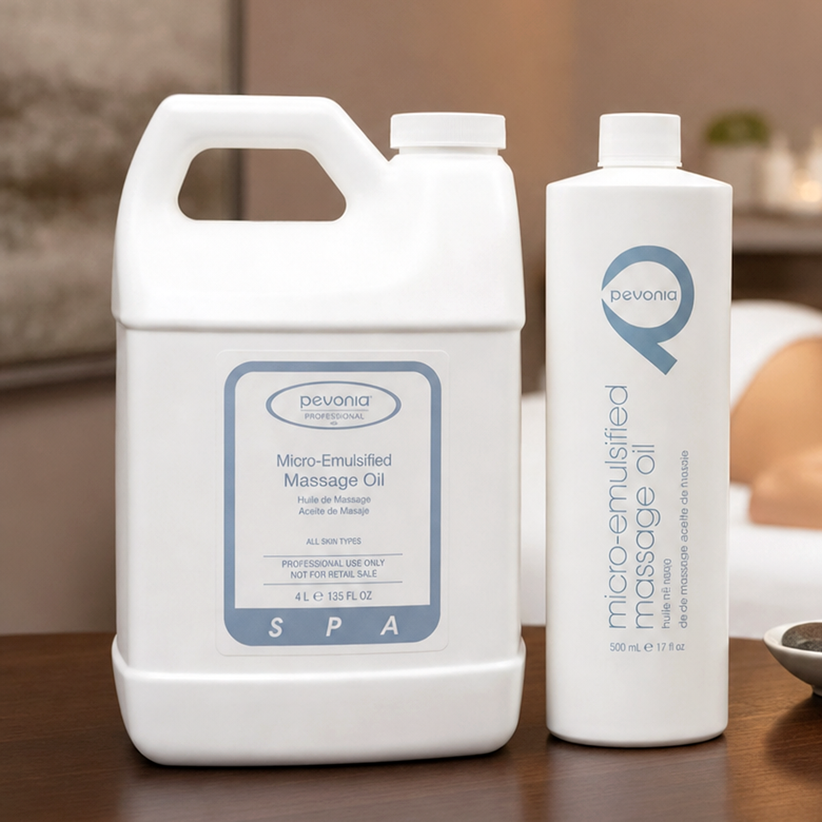 Pevonia Micro-Emulsified Massage Oil Anti-Stress 500ml bottle displayed on a therapist trolley in an upmarket day spa treatment room with unbranded massage treatment accessories.